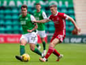Hibernian's Melker Hallberg and Aberdeen's Lewis Ferguson during Sunday's match at Easter Road. (Photo by Mark Scates / SNS Group)