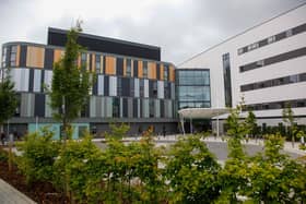 Edinburgh's new Sick Kids hospital cost millions due to construction issues.