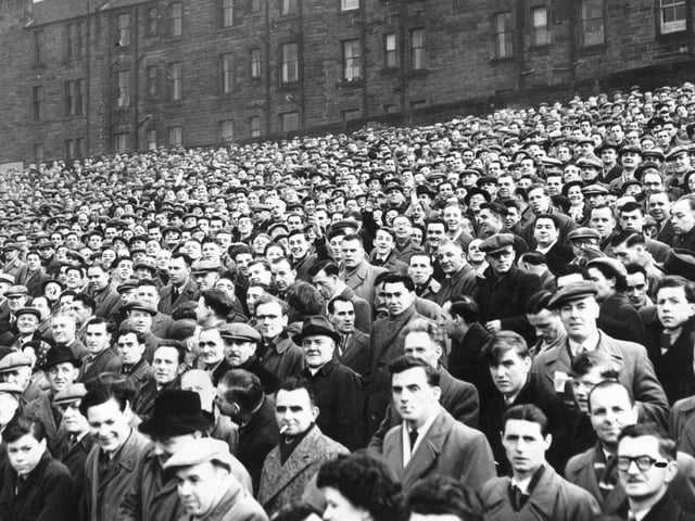 Crowds on the terracing at Tynecastle for the local derby match - Hearts v Hibs, 21st June 1954