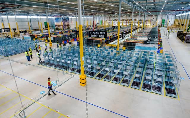 Vast Amazon warehouses have sprung up all over the world (Picture: Marco de Swart/ANP/AFP via Getty Images)