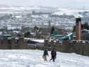 Fun in the snow in Holyrood Park. Picture: Lisa Ferguson/JPIMedia