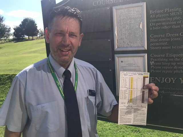 Grant Fleming shows off his card after posting a 59 at Craigmillar Park. Picture: Alan Wright