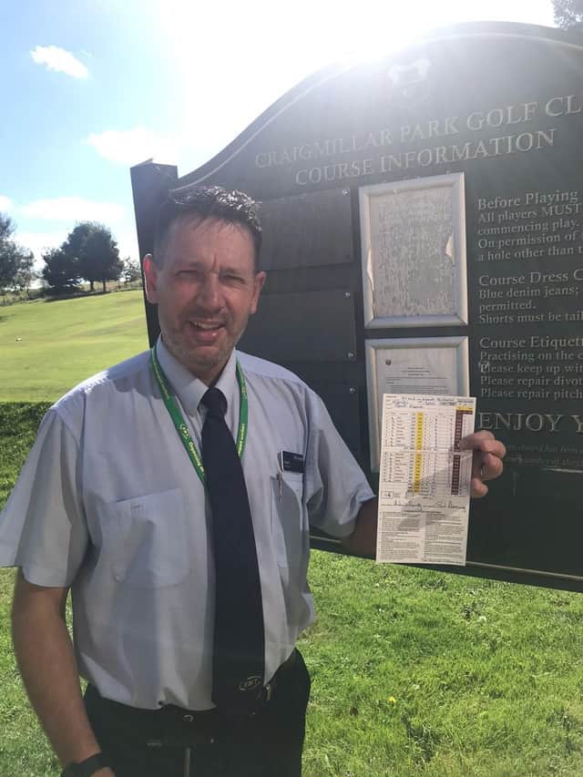 Grant Fleming shows off his card after posting a 59 at Craigmillar Park. Picture: Alan Wright