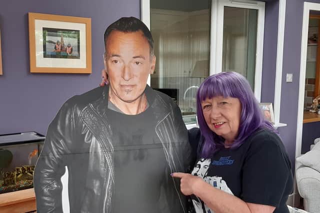 Angel McArthur with a carboard cut out of Bruce Springsteen - she danced with the real thing on stage in Edinburgh 42 years ago