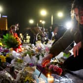 A makeshift memorial outside the scene of another deadly mass shooting in America, this time in Monterey Park, California (Picture: Mario Tama/Getty Images)