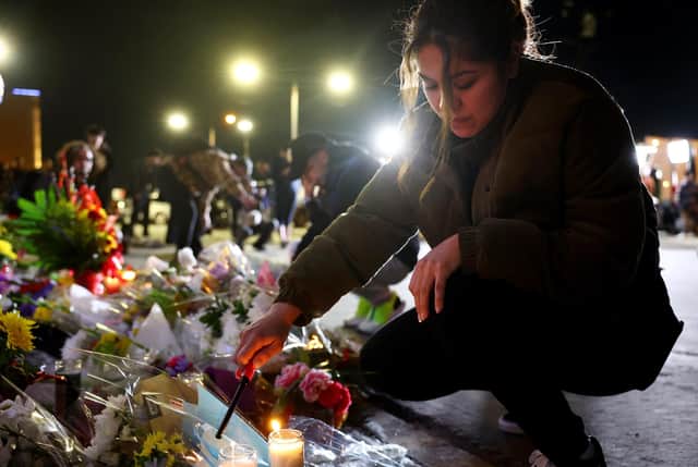 A makeshift memorial outside the scene of another deadly mass shooting in America, this time in Monterey Park, California (Picture: Mario Tama/Getty Images)