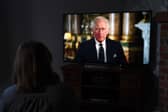 A child watching a broadcast of King Charles III first address to the nation as the new King