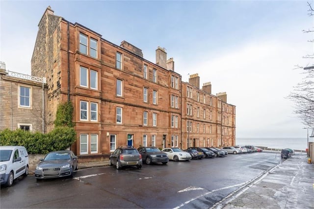 Lovers of city life beside the sea scrambled to get a closer look at this two-bed flat in Portobello. Set in a sandstone tenement building, the flat needs upgrading but it is full of great period features like cornicing, bay windows and high ceilings. There is an elegant sitting room, large dining room/kitchen, bathroom with a window and a choice of two double bedrooms. 
Currently under offer, this property was on the market at offers over £199,000.