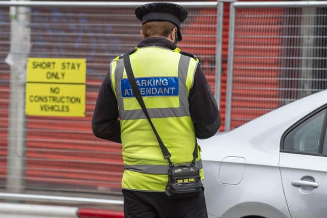 Traffic wardens will no longer wait for five minutes before issuing a ticket when motorists park on the pavement next to a yellow line.  Picture: Lisa Ferguson.