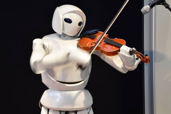 Artificially intelligent computers and robots look set to take over many human jobs and tasks. And could they go further? (Picture: Kazuhiro Nogi/AFP via Getty Images)