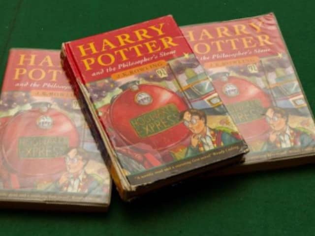 Three rare Harry Potter books are going under the gavel after being rescued from a school skip.