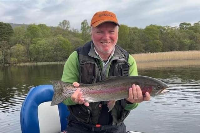 Stewart Inglis who will captain a Scotland men's team against an England team this summer with a superb trout from the Lake of Menteith. Contributed by Lake of Menteith