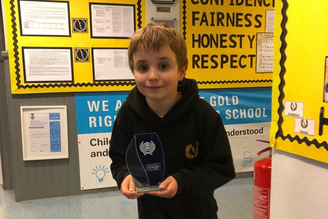 Primary four pupil at Low Port School Quinn Brodie has climbed three peaks to raise money and awareness of homelessness.