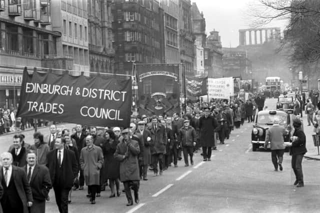 Miners march along Princes Street in Edinburgh during the miners' strike in January 1972.  Picture: George Smith.