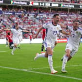 John McGinn and Kenny McLean wheel away to celebrate the latter's winner in Norway on Saturday. Picture: Zac Goodwin/PA Wire.