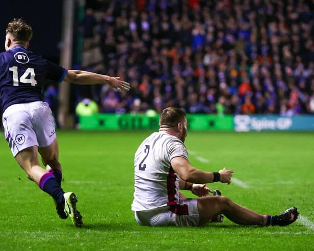 A penalty try is awarded  after England’s Luke Cowan-Dickie plays a forward pass out of play under challenge Dary Graham.