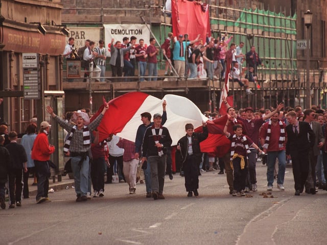 Hearts fans on Gorgie Road celebrating their side's Scottish Cup triumph over Rangers in 1998.