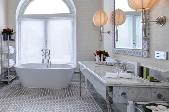 Marble and a free-standing bath make the bathroom in the Scone & Crombie Suite a luxurious place to relax