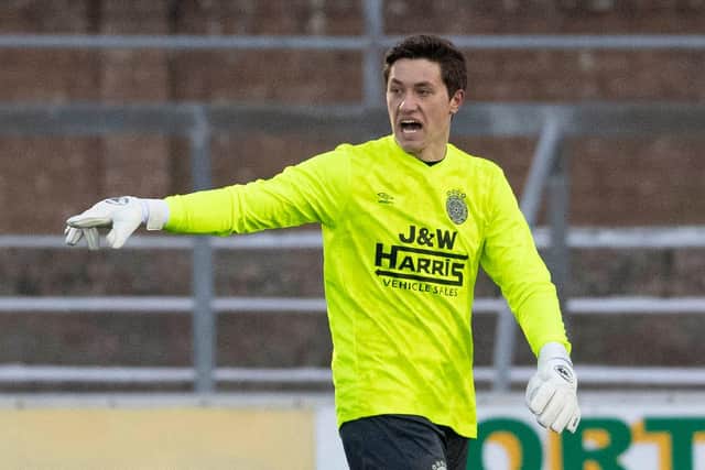 Brian Schwake in action for Linlithgow Rose in a Scottish Cup tie against Forfar Athletic