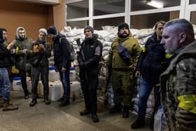 Members of a Territorial Defence unit prepare to deploy to various parts of the city on March 02, 2022 in Kyiv, Ukraine.
