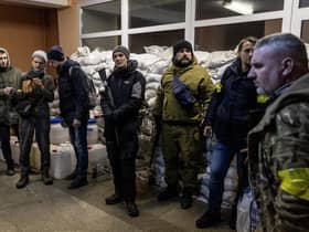 Members of a Territorial Defence unit prepare to deploy to various parts of the city on March 02, 2022 in Kyiv, Ukraine.