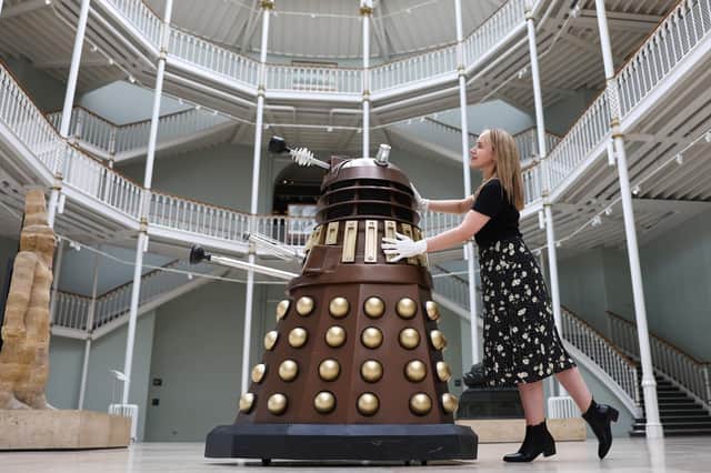 A dalek from Dr Who invades the National Museum of Scotland, helped by staff member Liv Mullen (Picture: Jeff J Mitchell/Getty Images)