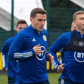 Hibs defenders Paul Hanlon and Ryan Porteous during a Scotland training session last month.