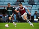 John McGinn in action for Aston Villa in a Premier League match with Leeds United