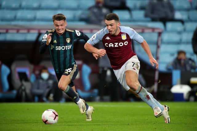 John McGinn in action for Aston Villa in a Premier League match with Leeds United