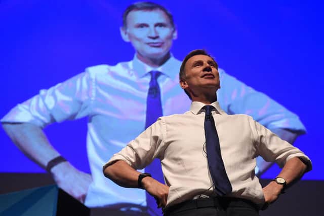 Jeremy Hunt is risking the UK's economic stability by reducing regulation of the financial sector (Picture: Oli Scarff/AFP via Getty Images)