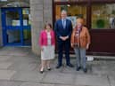 Tom Arthur, Minister for Public Finance, Planning and Community Wealth, with Ellen Scott, Chair of Gorebridge Community Cares, and local MSP Christine Grahame.