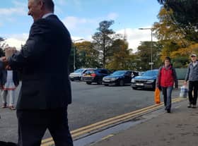 A disabled driver was "angry and disgusted" when he saw that dignitaries visiting Edinburgh's Royal Botanic Garden had left their limousines in the spaces where blue badge holders have been banned from parking.
