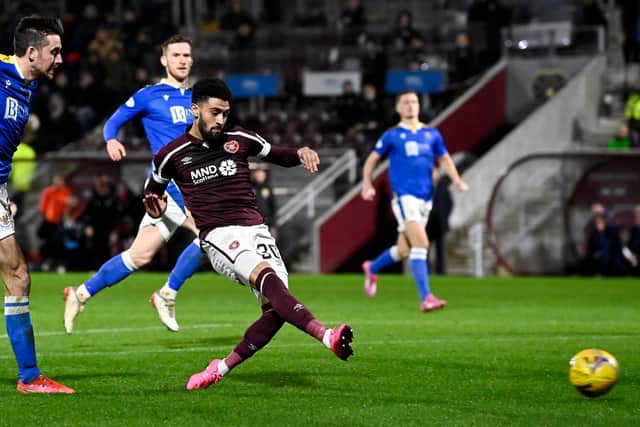 Josh Ginnelly scores the opening goal for Hearts against St Johnstone.