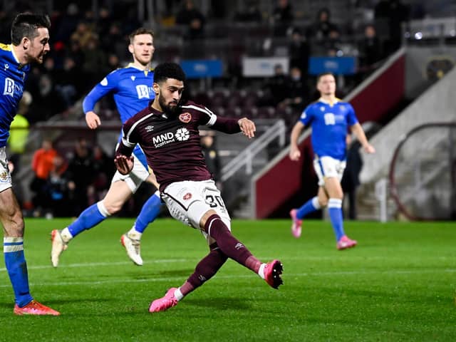 Josh Ginnelly scores the opening goal for Hearts against St Johnstone.
