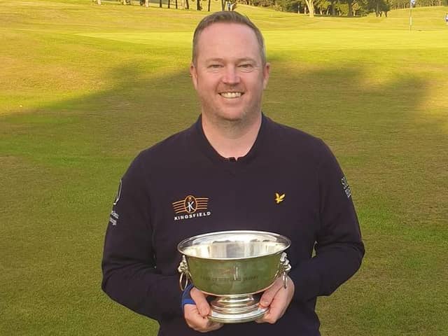 Kingsfield's Allyn Dick shows off the South East District Champinonship trophy after his weekend win at Turnhouse.