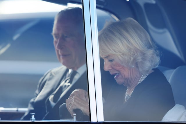 King Charles III and the Queen Consort arrive at Edinburgh Airport after travelling from London, ahead of joining the procession of Queen Elizabeth's coffin from the Palace of Holyroodhouse to St Giles' Cathedral, Edinburgh. Picture date: Monday September 12, 2022.