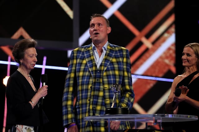 Doddie Weir (centre) receives the Helen Rollason Award from the Princess Royal during the BBC Sports Personality of the Year 2019 at The P&J Live, Aberdeen.
