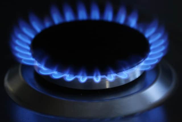 A gas hob burning. Household energy bills are likely to remain at more than two-and-a-half times their pre-crisis levels until at least 2024, a dire new prediction has warned. Picture: Gareth Fuller/PA Wire