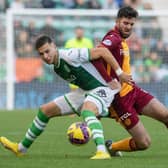 Hibs' Mykola Kukharevych and Sean Goss of Motherwell battle for the ball during the previous cinch Premiership match between the two teams