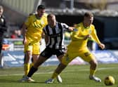 James Scott of Hibs tries to give St Mirren's Curtis Main the slip during the last meeting between the two team