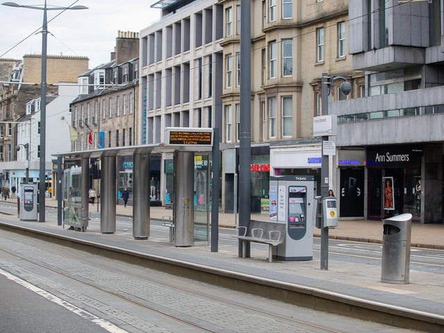 An empty tram stop on Princes Street.