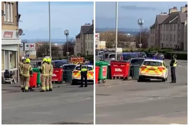 Police and firefighters called to West Granton Road in Edinburgh, after an incident involving a young boy on a rooftop. (Photo credit: Paul Elder)