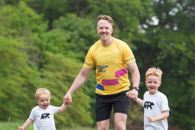 In training: Neil with sons Joel, two and six-year-old Arlo