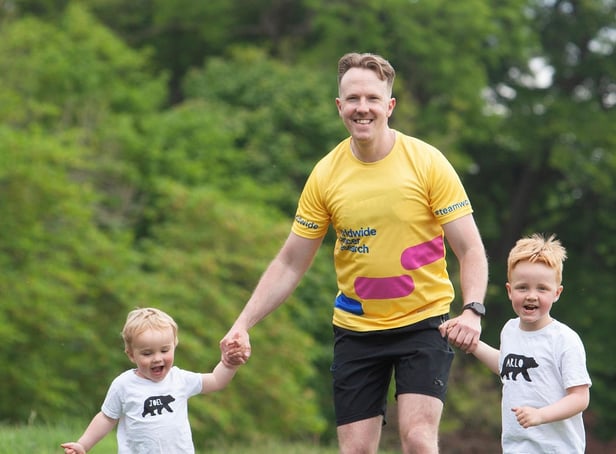 In training: Neil with sons Joel, two and six-year-old Arlo