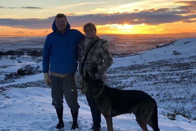Harry with wife Carrie and dog Corey at Bathgate's Knock Hill