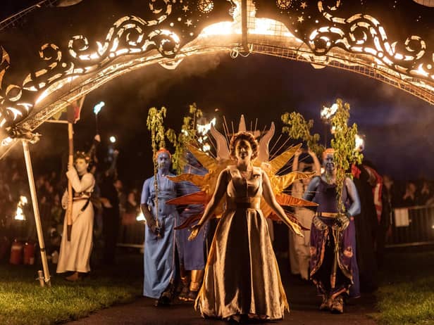 The May Queen leads a procession of characters up Calton Hill for the 2023 Beltane Fire Festival in Edinburgh.