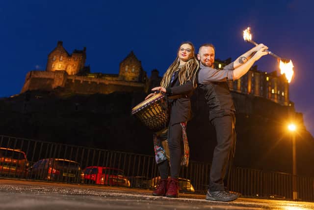 Noise Committee's Judyta Tulodzieck and Circus Alba's James Armandy are ready for the Edinburgh Torchlight Procession. Photo by Duncan McGlynn.
