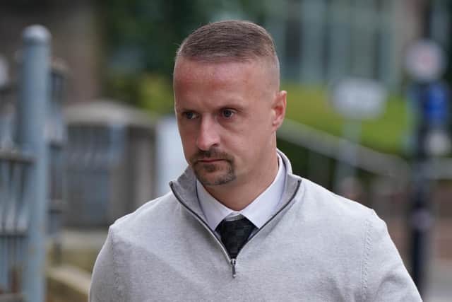 Footballer Leigh Griffiths leaves Dundee Sheriff Court after he was fined for kicking a pyrotechnic device into a crowd.  Photo: Andrew Milligan/PA Wire
