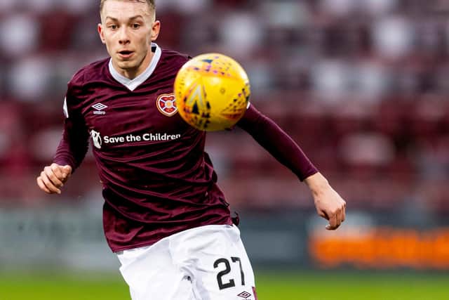 Lewis Moore will stay at Hearts for another two years.