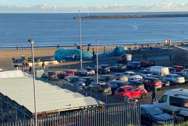 Cars parked by Roker Beach.